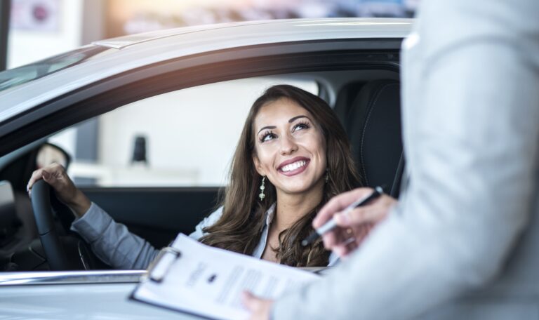Auto insurance agent assisting customer